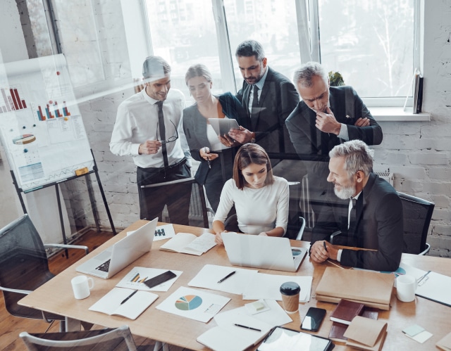 people discussing in the office