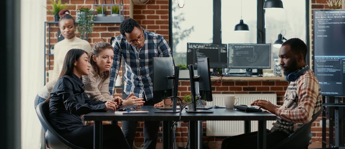 a group of people happily collaborating