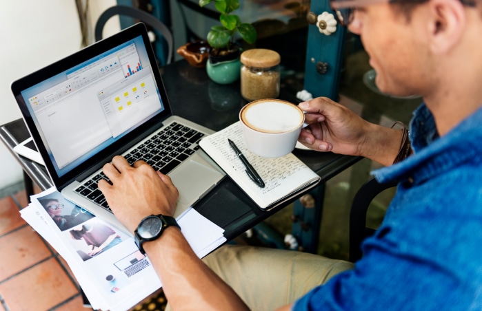 man working in a coffeee shop